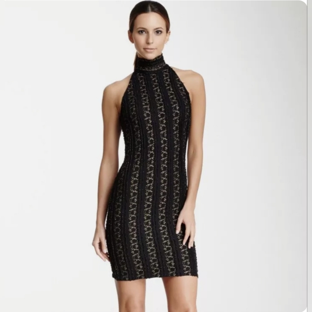Claudia black and gold dress by Torn